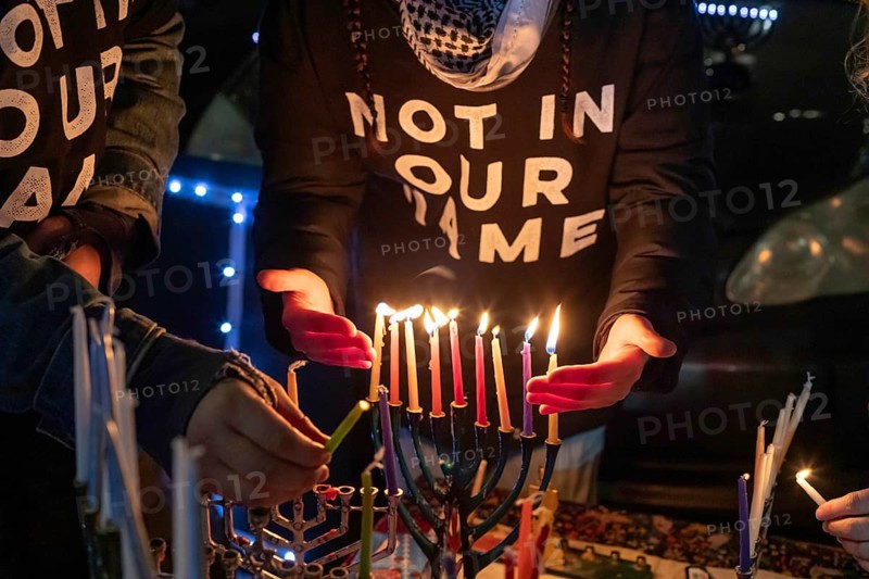 Detroit, Michigan USA, 7 December 2023, On the first night of Hanukkah, Jews for Ceasefire gathered to light menorahs, calling for a ceasefire in the fighting in Gaza