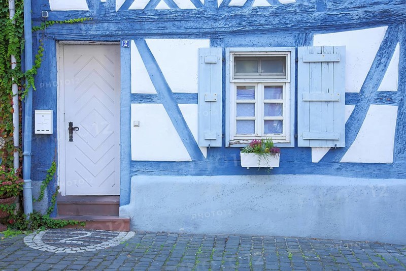 Half-timbered house with floor mosaic as house number 2, two and window, number, blue, Steinheim, Hanau, Hesse, Germany, Europe