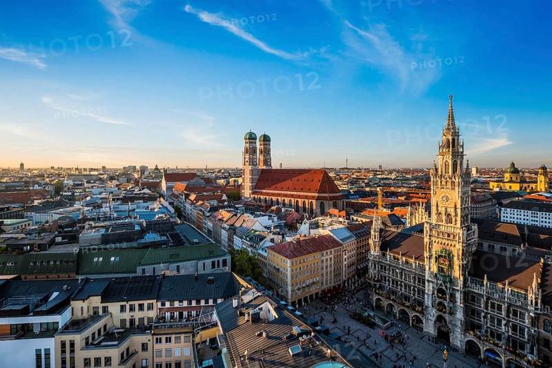 Aerial view of Munich, Marienplatz, Neues Rathaus and Frauenkirche from St. Peter's church on sunset. Munich, Germany, Europe