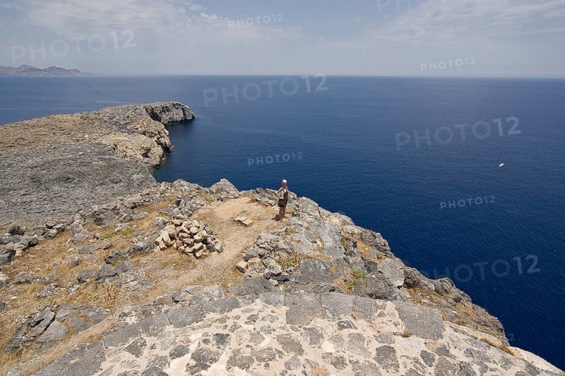 Rhodes Island, Lindos, Lindos is a town on the Greek island of Rhodes. Its landmark is the acropolis on a rock with huge archways from the 4th century and reliefs dating from around 280 BC. Coast