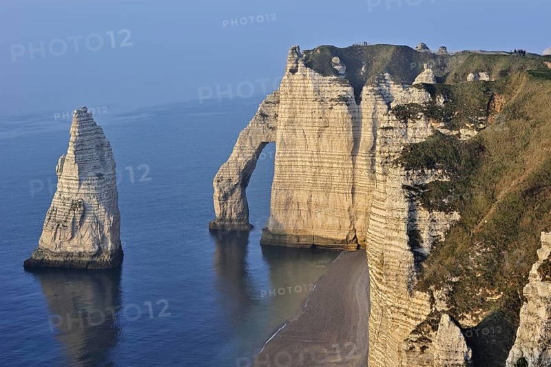 L'Aiguille and the Porte D'Aval, a natural arch in the chalk cliffs at Etretat, Côte d'Albâtre, Upper Normandy, France, Europe