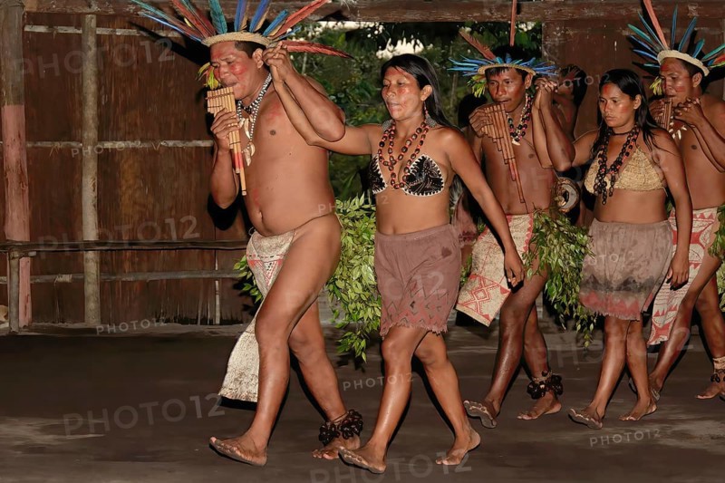 Traditional tribal dance from the Dessanos tribe with face paintings and wearing a traditional hat made of feathers, Rio Taruma, Manaus, Amazon state, Brazil, South America