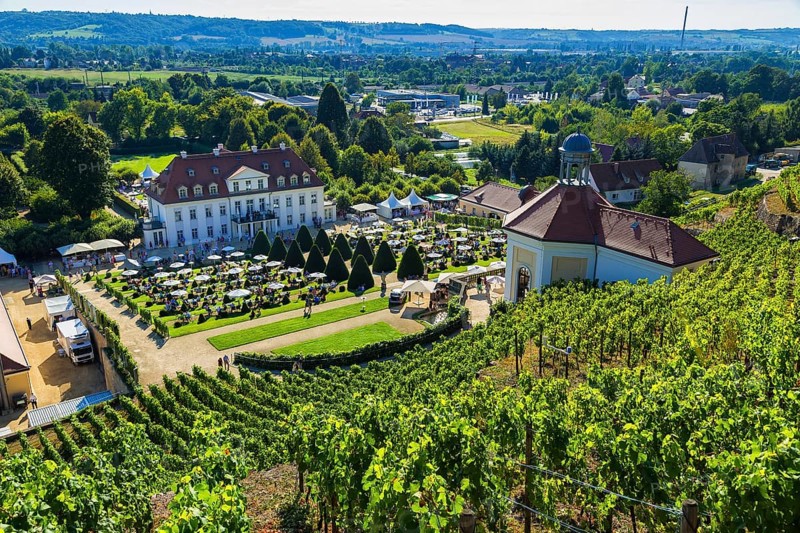 Wackerbarth Castle or Wackerbarths Ruh is a Baroque castle surrounded by vineyards in the Niederlößnitz district of Radebeul on the road to Meißen, which serves as the seat of the Saxon State Winery. The winery belongs to the Lößnitz vineyard and is located in the Radebeuler Johannisberg vineyard