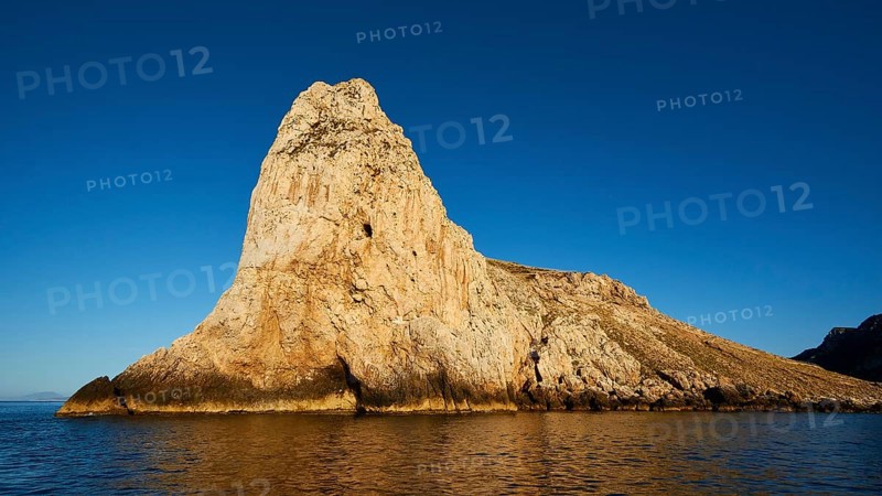 Evening light, Boat tour, View from the sea, Bizarre rock formations, Rugged mountains, Marettimo, Egadi Islands, Sicily, Italy, Europe