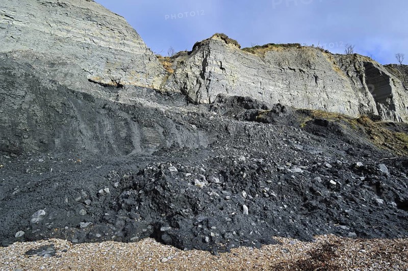 Black Ven landslide on beach between Lyme Regis and Charmouth along the Jurassic Coast, Dorset, southern England, UK
