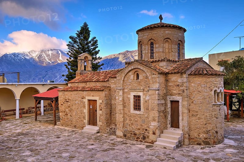 Byzantine church, dome, bell centre, tree, snow-capped mountains, cloudy blue sky, Myriokephala, Orthodox monastery, Crete, Greece, Europe
