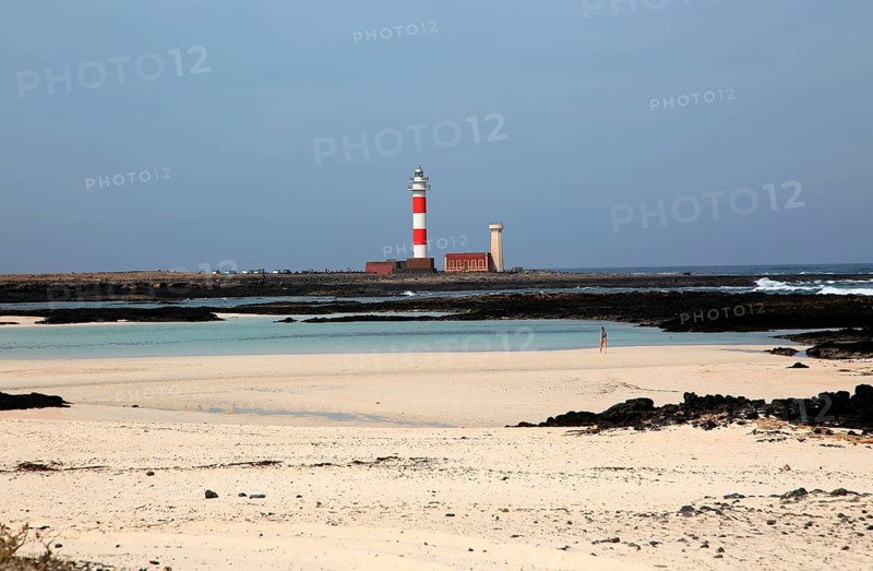Red and white striped lighthouse, Faro de Toston, El Cotillo, Fuerteventura, Canary Islands, Spain, Europe