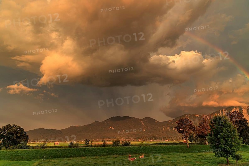 Evening mood with clouds and rainbow over mountains, summer, Loisach-Lake Kochel-Moore, view of Rabenkopf and Jochberg, Bavaria, Germany, Europe