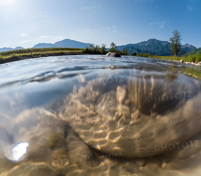 Underwater photograph of a river in front of mountains in sunlight, summer, Loisach, Schlehdorf, Alpine foothills, Bavaria, Germany, Europe