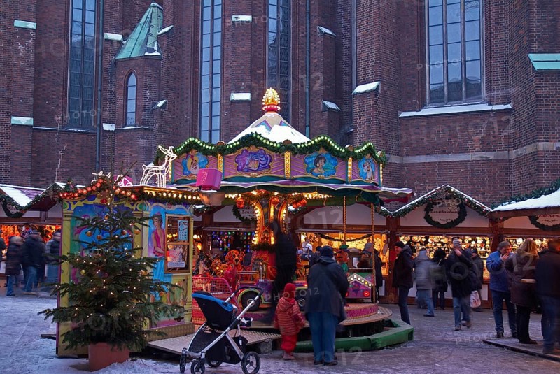 Europe, Germany, Hamburg, Christmas market in front of St Peter's Church, Children's carousel, Europe