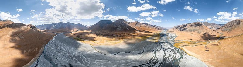 Aerial view, Burkhan mountain valley with meandering river, barren dramatic mountain landscape, Terskey Ala-Too, Tien Shan, Issyk Kul province, Kyrgyzstan, Asia