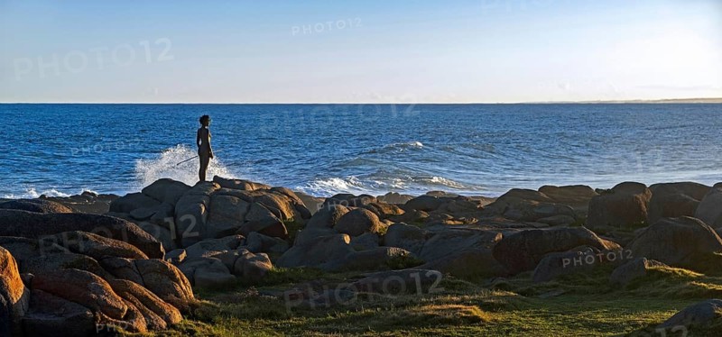 Statue of Guyunusa, la última mujer charrúa, last Charrua, indigenous people of Uruguay on the rocky shore of Cabo Polonio, Rocha Department