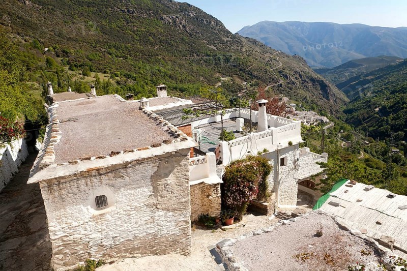 Houses in the village of Bubion, High Alpujarras, Sierra Nevada, Granada province, Spain, Europe