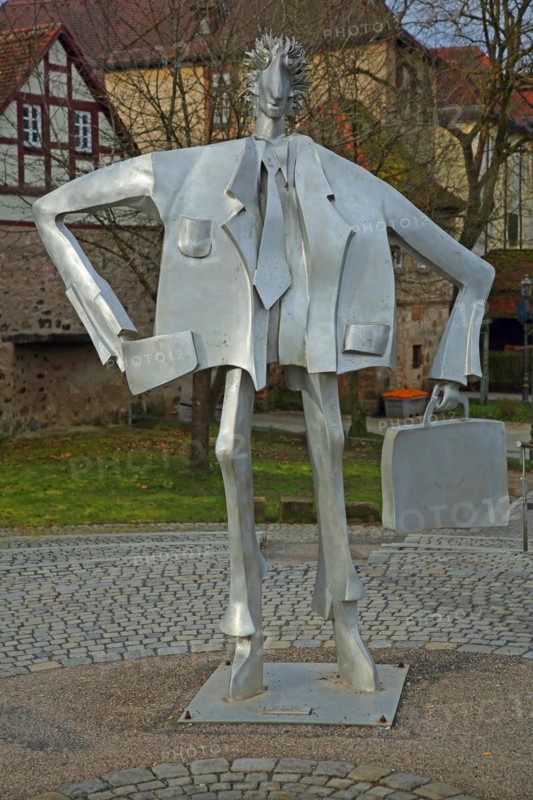 Sculpture Man with suitcase by Kurt Laurenz Metzler 2007, sculpture mile, male figure, sheet metal, carry, arm, hand, hold, hand luggage, suitcase, tie, grey, modern art, An der Riviera, Ansbach, Middle Franconia, Franconia, Bavaria, Germany, Europe