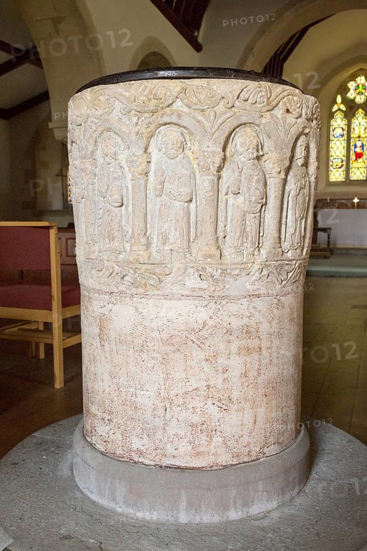 Norman baptism font village parish church of Saint John the Baptist, Chirton, Vale of Pewsey, Wiltshire, England, UK