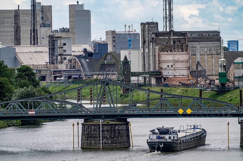 The Rhine harbour Krefeld, inland port, 4th largest public harbour in North Rhine-Westphalia, trimodal handling of goods, goods, containers, general cargo, freighters entering the harbour basin, swing bridge, North Rhine-Westphalia, Germany, Europe