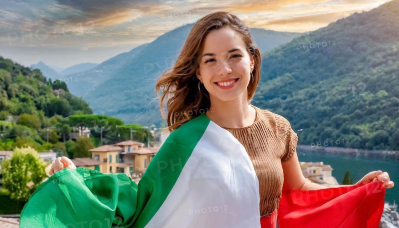 A woman with an Italian flag smiles in front of a picturesque lakeside location, Italy, AI generated, AI generated, Europe