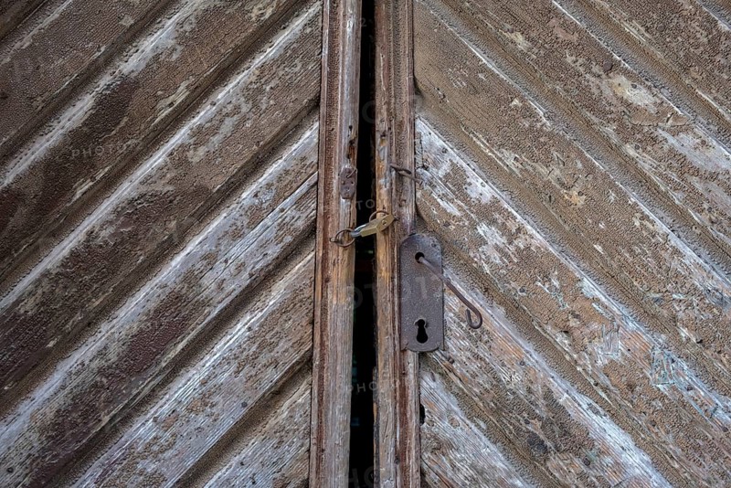An old, rusty door with a padlock and clear signs of use, Istria, Croatia, Europe