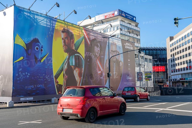 Advertising, large poster, for the new streaming service Disney Plus, in Düsseldorf
