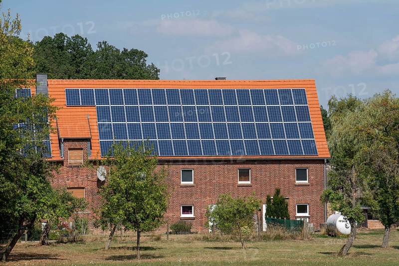 Residential building with photovoltaic system on the pitched roof, North Rhine-Westphalia, Germany, Europe