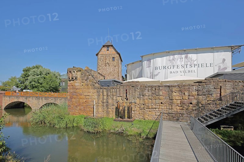 Moated castle built in the 12th century and landmark during the castle festival, festival, inscription with banner, bridge, footbridge, pond, Bad Vilbel, Wetterau, Hesse, Germany, Europe