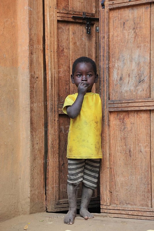 South Ethiopia, Ari people, little boy standing in the front door, Ethiopia, Africa