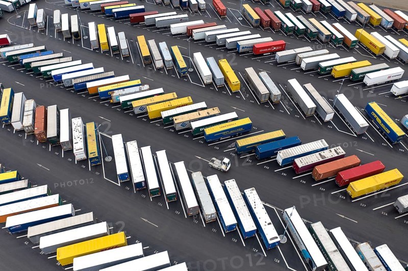 Containers and swap trailers are parked in a car park at the Tesla Gigafactory, Grünheide, 28.01.2023