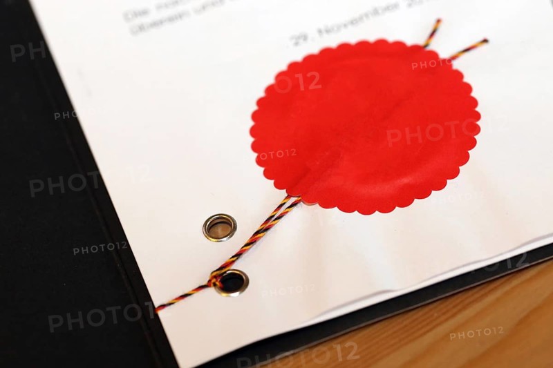 Notarised contract with red official seal