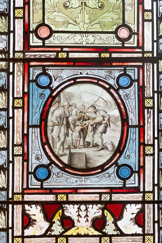 Flemish images in stained glass window church of Saint John, Saxmundham, Suffolk, England, UK- Works of Mercy give water to the thirsty