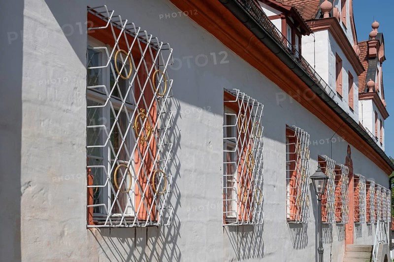 Grilles in front of the windows of the former chancellery and banqueting hall wing of the ducal residence, then rent office, now tax office, Spitalwinkel 3, Hiltpoltstein, Middle Franconia, Bavaria, Germany, Europe