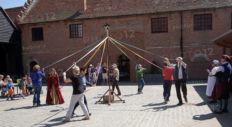 People maypole dancing during Tudor history re-enactment day, Layer Marney Tower, Essex, England, United Kingdom, Europe
