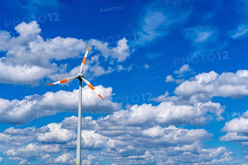 Wind turbine, wind energy plant from the manufacturer Enercon, blue sky with many white clouds, near Schermbeck, North Rhine-Westphalia, Germany, Europe