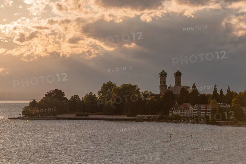 Baroque castle church, double tower, onion dome, evening light, sunbeams, Friedrichshafen on Lake Constance Baden-Württemberg, Germany, Europe