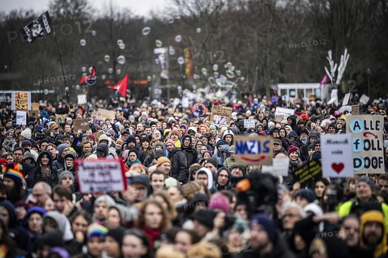 150, 000 people gather around the Bundestag in Berlin to build a human wall against the shift to the right in society. We are the firewall chanted demonstrators from a wide range of social groups. Recordings on 03.02.2024 in Berlin