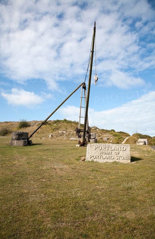 Antique crane forming monument to the quarrying heritage as the Home of Portland Stone, Isle of Portland, Dorset, England, United Kingdom, Europe