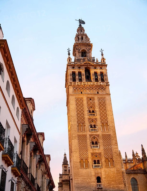 La Giralda tower of the cathedral originally built as a Moorish minaret in the twelfth century, Seville, Spain, Europe