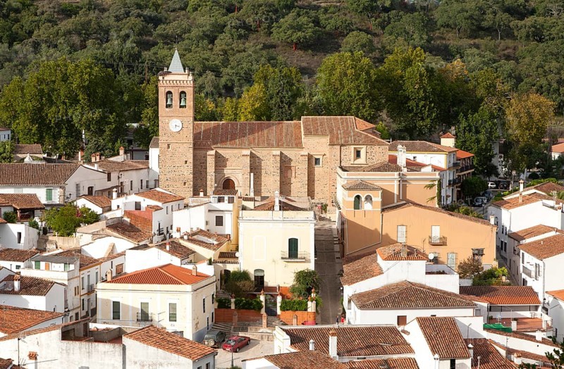 Church and houses in village of Almonaster La Real, Sierra de Aracena, Huelva province, Spain, Europe