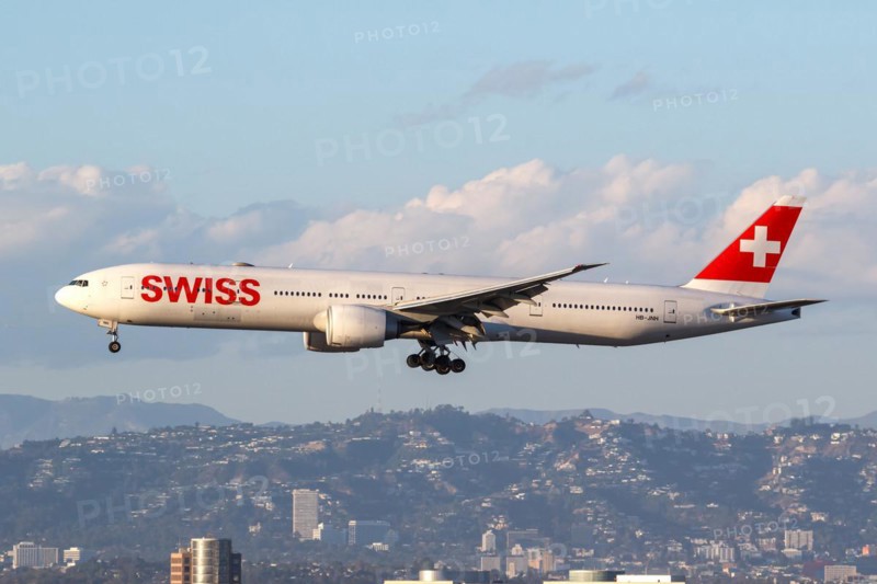 A Swiss Boeing 777-300 (ER) aircraft with the registration HB-JNH at Los Angeles Airport, USA, North America