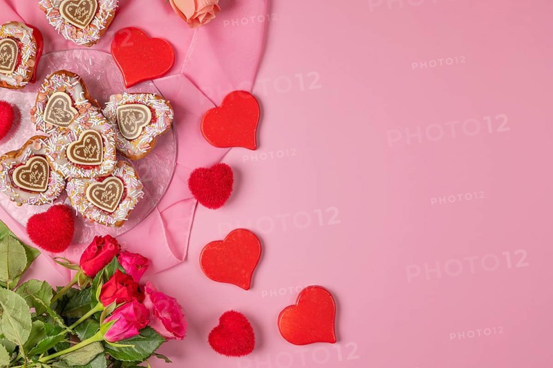 Heart-shaped cupcakes, red hearts and roses, Valentine's Day, pink background