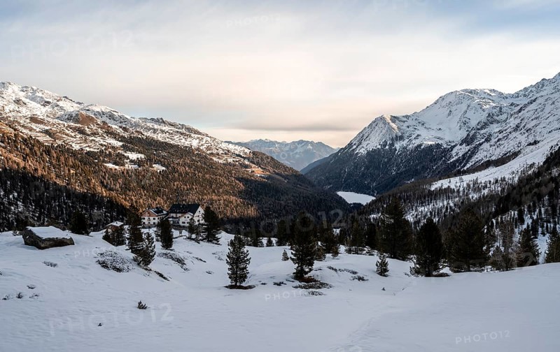 Zufallhütte mountain hut, morning light in a snow-covered mountain landscape, Val Martello, Ortler Alps, Venosta Valley, Italy, Europe