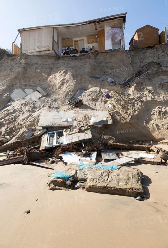 March 2018, Clifftop property collapsing due to coastal erosion after recent storm force winds, Hemsby, Norfolk, England, UK