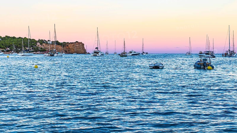Sailing yachts at the blue hour in the bay of Talamanca, Eivissa, Ibiza Town, Ibiza, Balearic Islands, Mediterranean Sea, Spain, Europe