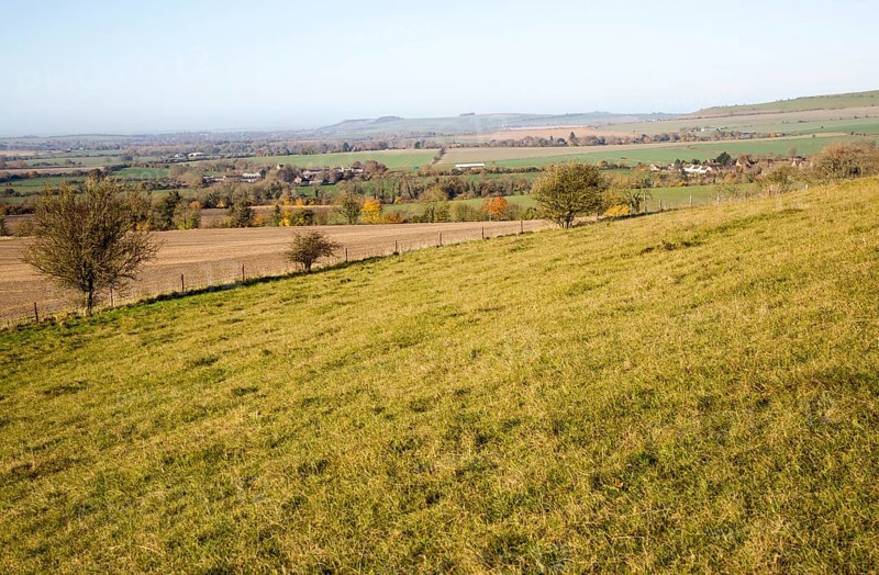 View of the Vale of Pewsey looking west from Woodborough Hill, Wilcot, Wiltshire, England, UK