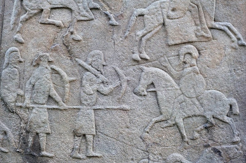 Detail of battle scene on the rear of the Aberlemno Kirkyard Cross Slab, a Pictish stone in Scotland