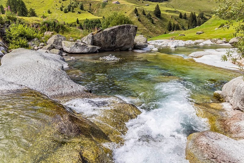 Rein da Christallina torrent near Medel. Pools with crystal-clear water in the riverbed. Canton of Graubünden, Switzerland, Europe