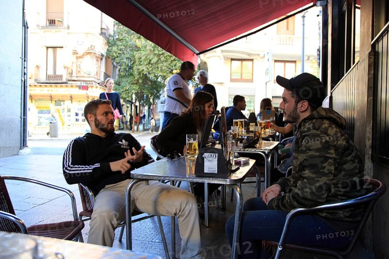 People drinking outside, Cerveceria 100 Montaditos chain bar pub, Madrid city centre, Spain, Europe