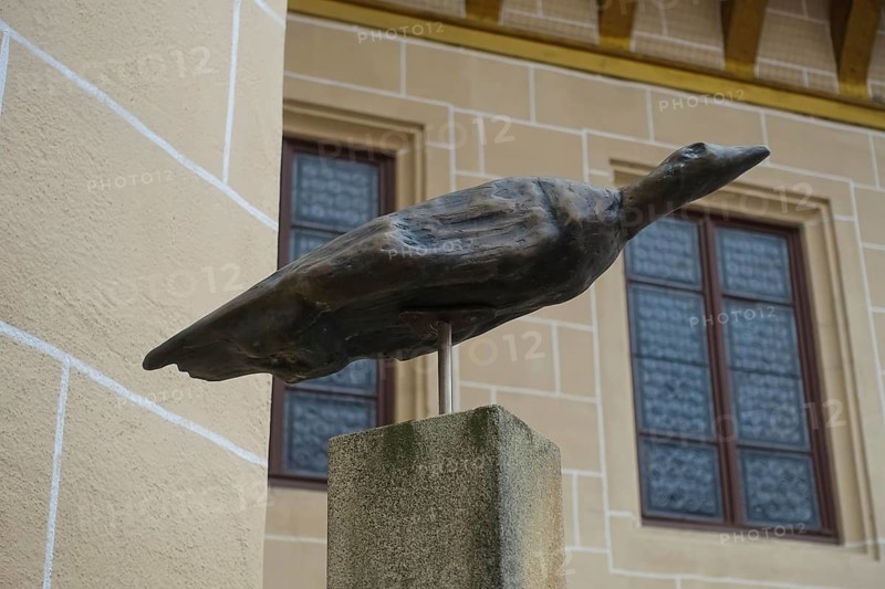 Bronze waterfowl replica, the bird herding horse is one of the oldest works of art of mankind, UNESCO World Heritage Site, Ice Age art, sculpture, information board, writing, letters, inner courtyard, Hohentübingen Palace, Museum of the University of Tübingen MUT, higher education institution, historical building, place of learning, Renaissance complex built in the 16th century, in the palace courtyard, Eberhard Karls University of Tübingen, Tübingen, Baden-Württemberg, Germany, Europe