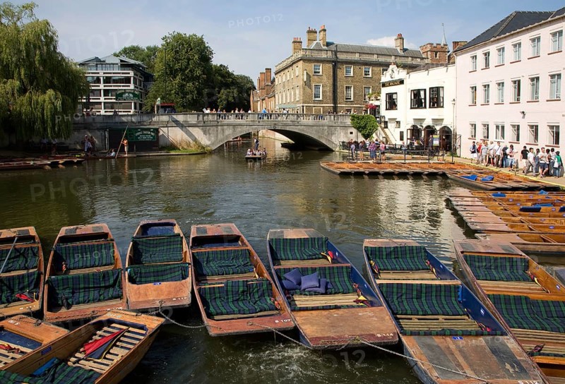 People punting in small boats on the River Cam near Silver Street Bridge, Cambridge, England, United Kingdom, Europe