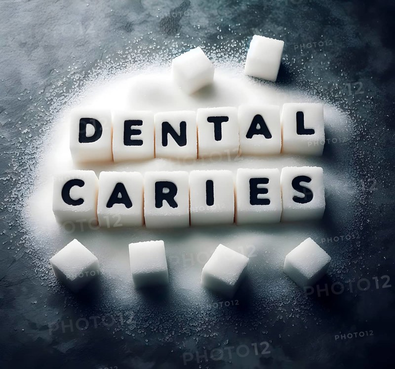 The words dental caries, caries, are formed from sugar cubes, symbol image disease, obesity, diabetes, AI generated, AI generated