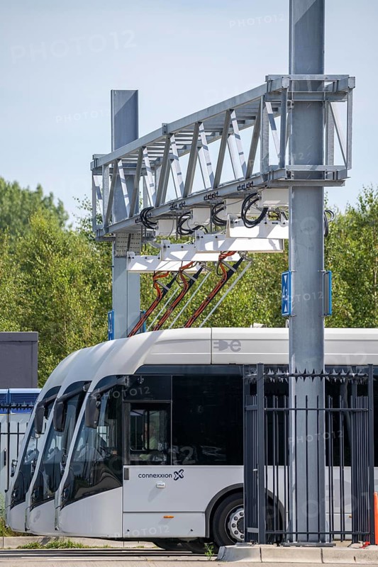 Fast charging station for electric buses at Amsterdam Schiphol Airport, the entire fleet of passenger transport buses is electric, over 200 vehicles, during breaks the buses are recharged via a roof-mounted pantograph, vehicles of the transport company Connexxion, Netherlands